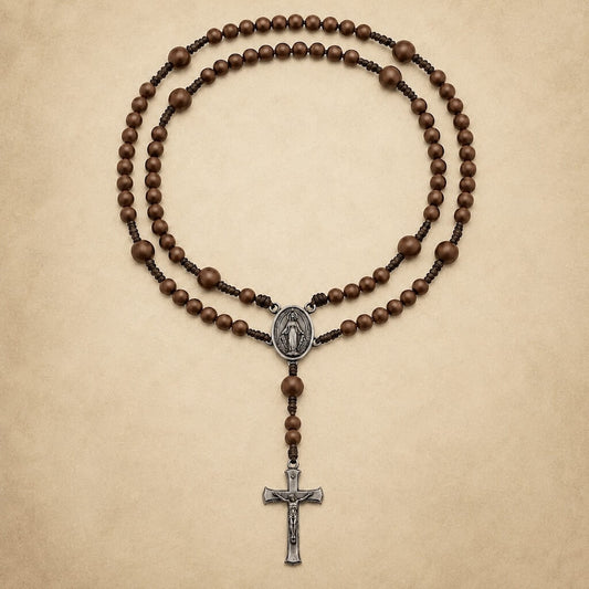 Brown Compact Everyday Rosary with warm matte beads, a Miraculous Medal centerpiece, and a silver-tone crucifix.
