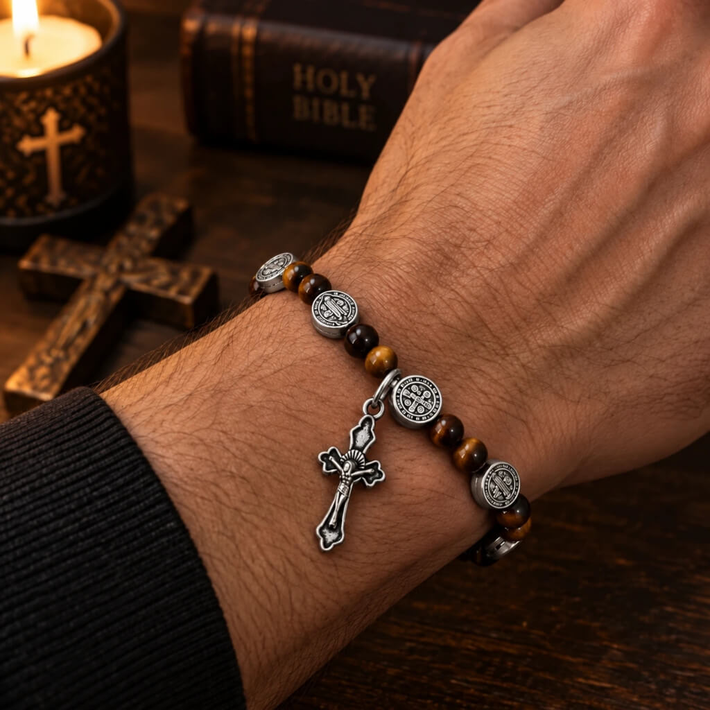 Men wearing tiger eye Catholic bracelet with silver religious medals and crucifix charm
